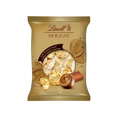 Produktbild: lindt nougat kugeln mit haselnusscreme in vollmilchschokolade 101g weihnachtsschokolade