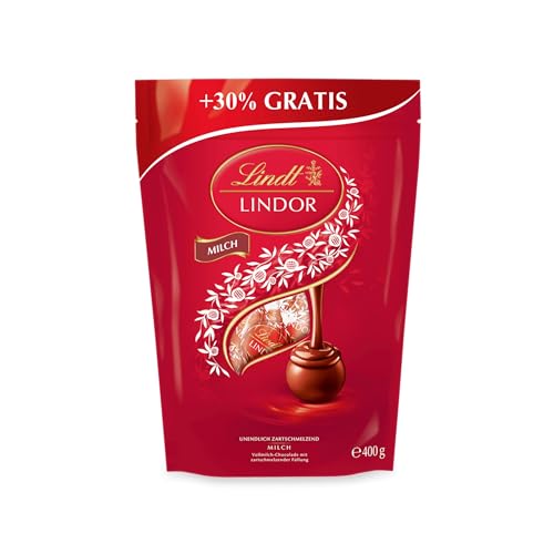 Entdecken Sie die zarte Welt der Lindt LINDOR Kugeln! 400 g vollmilchige Schokoladenpralinen mit unwiderstehlich cremiger Füllung  das perfekte Geschenk!